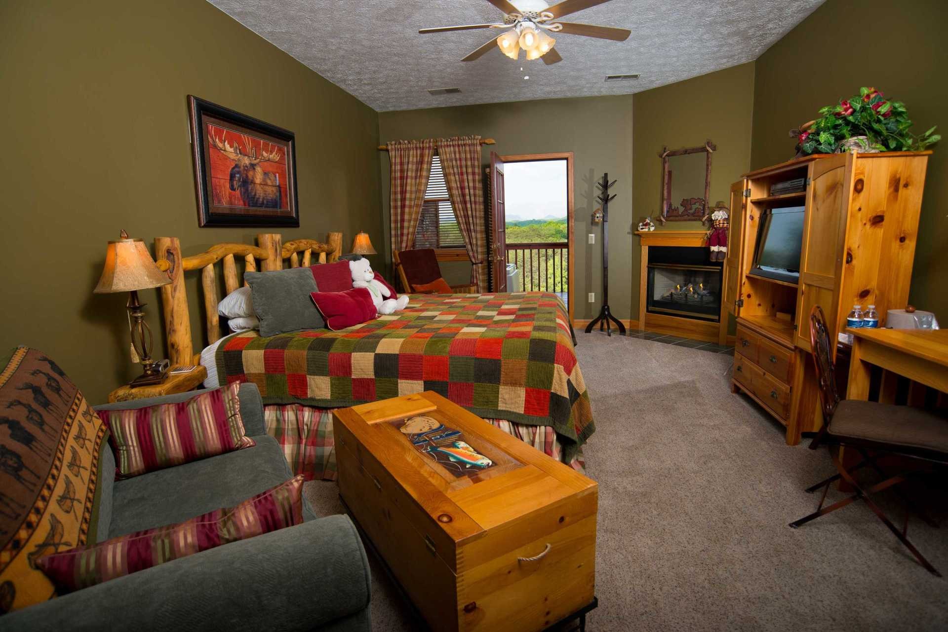 2149 Seaton Springs Road Sevierville, TN 37862 - Photo 3 of 26 a bedroom with furniture and a flat screen tv