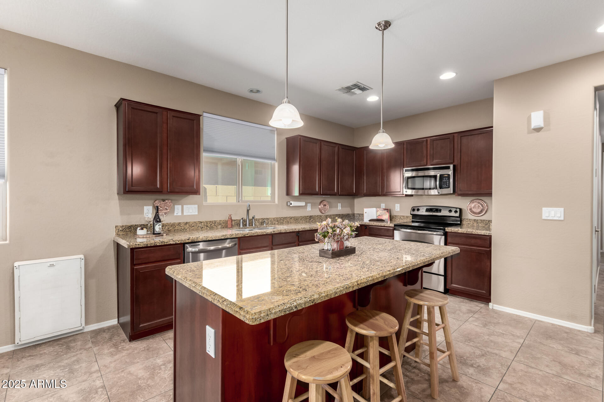 16093 West Almeria Road Goodyear, AZ 85395 - Photo 10 of 38 upgraded kitchen