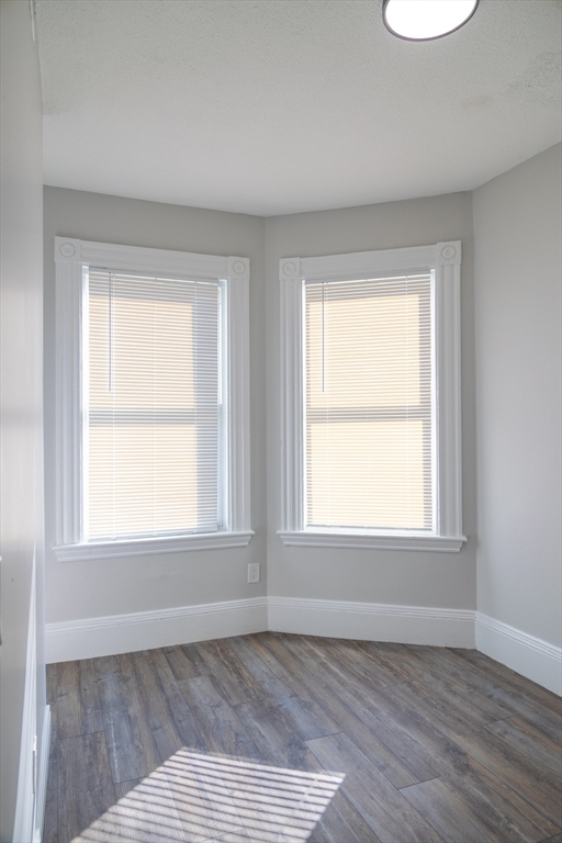 626 East 6th Street, Unit 3 Boston, MA 02127 - Photo 3 of 5 an empty room with a window