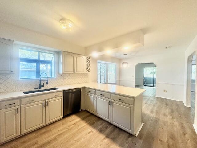 708 Caribbean Way Niceville, FL 32578 - Photo 12 of 34 a large kitchen with a sink and cabinets