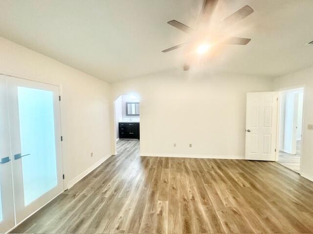 708 Caribbean Way Niceville, FL 32578 - Photo 22 of 34 a view of empty room with wooden floor