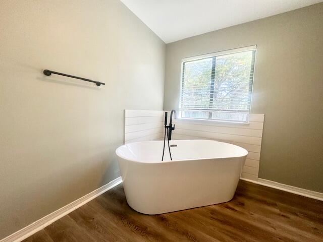 708 Caribbean Way Niceville, FL 32578 - Photo 25 of 34 a white bath tub sitting in a bathroom