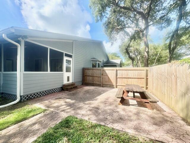 708 Caribbean Way Niceville, FL 32578 - Photo 33 of 34 a white house that has tree in front of it