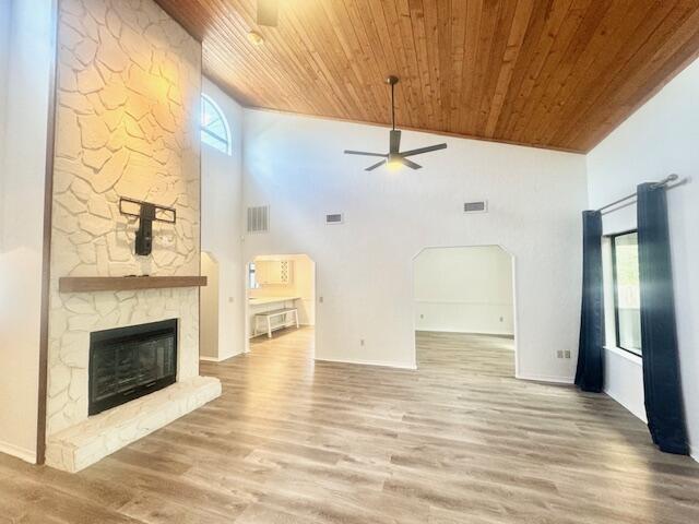 708 Caribbean Way Niceville, FL 32578 - Photo 7 of 34 a view of an empty room with wooden floor a fireplace and a window