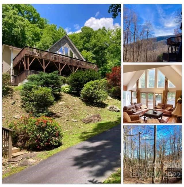 160 Flying Hawk Road Waynesville, NC 28786 - Photo 1 of 45 a house view with a garden space