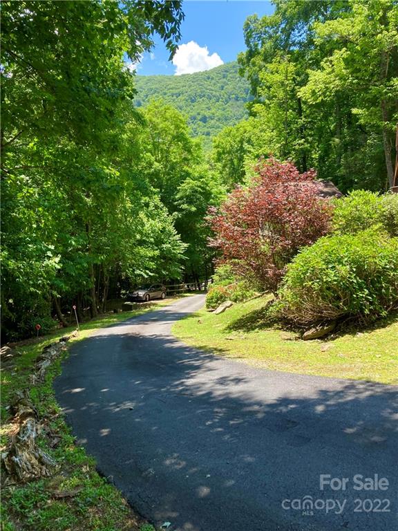 160 Flying Hawk Road Waynesville, NC 28786 - Photo 18 of 45 a view of an outdoor space and yard