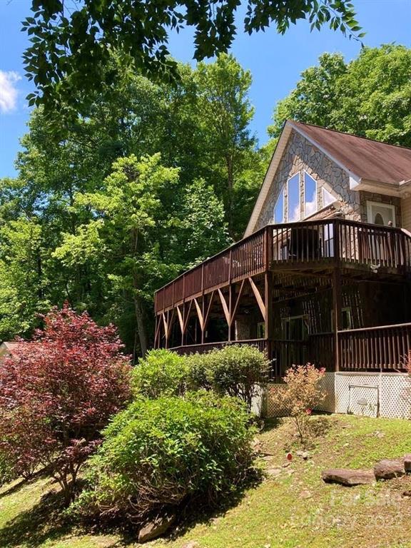 160 Flying Hawk Road Waynesville, NC 28786 - Photo 26 of 45 a view of house with a yard