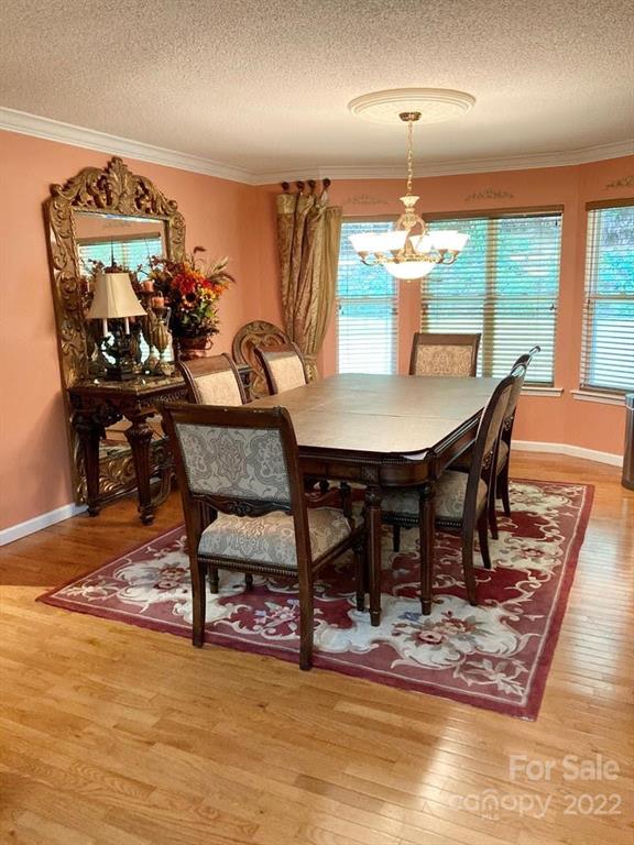 160 Flying Hawk Road Waynesville, NC 28786 - Photo 5 of 45 a view of a a dining room with furniture window and outside view