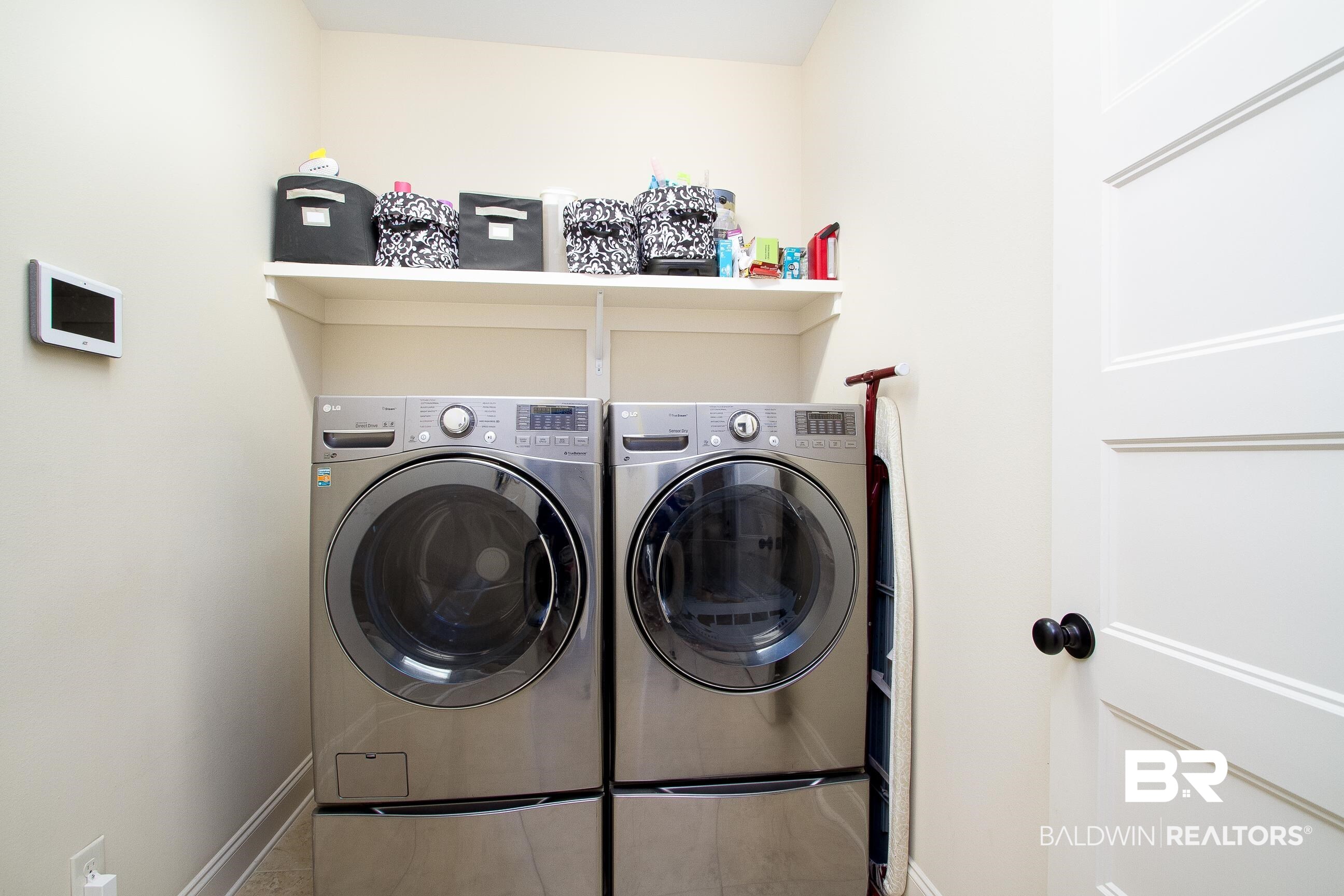 8625 Rosedown Lane Daphne, AL 36526 - Photo 21 of 29 Laundry room featuring independent washer and dryer