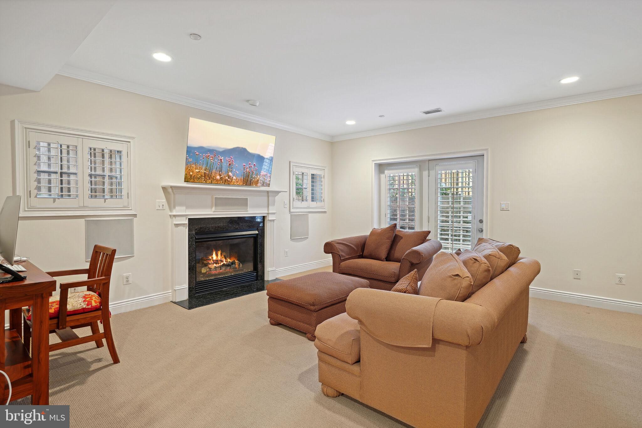 6309 Wiscasset Road Bethesda, MD 20816 - Photo 38 of 50 Lower Level Rec Room with Fireplace