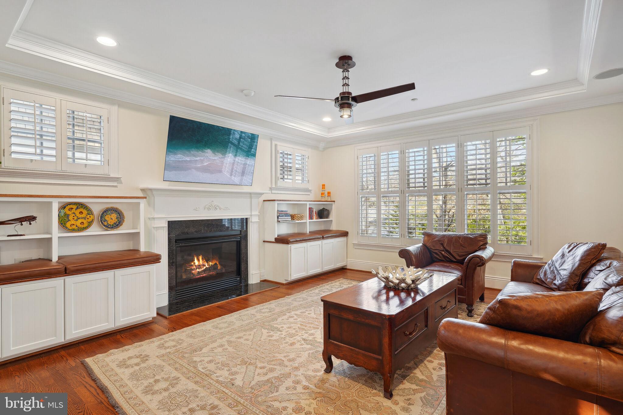 6309 Wiscasset Road Bethesda, MD 20816 - Photo 9 of 50 Family Room with Handsome Built-ins and Fireplace
