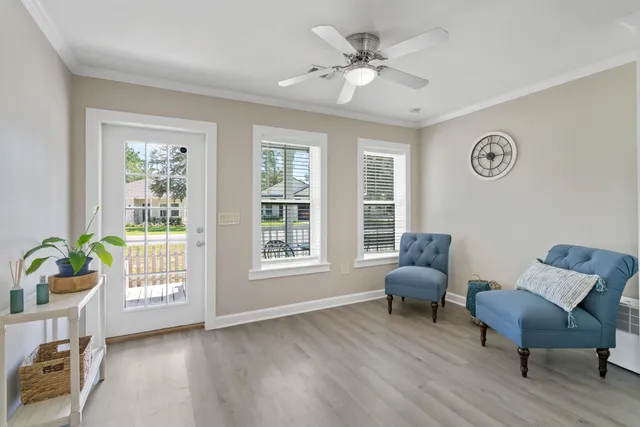 a living room with furniture and a window