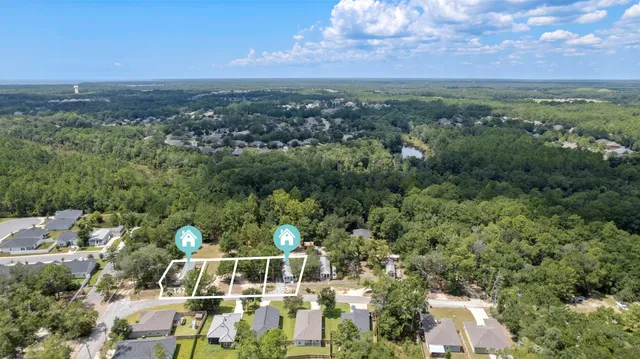 a view of a city with mountains in the background