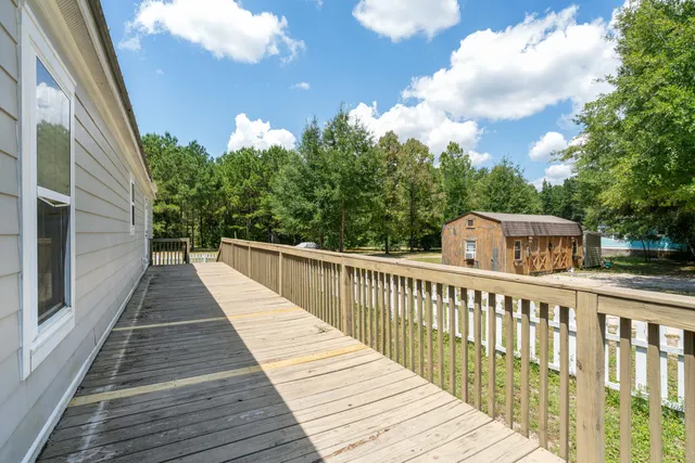 a view of a house with large windows