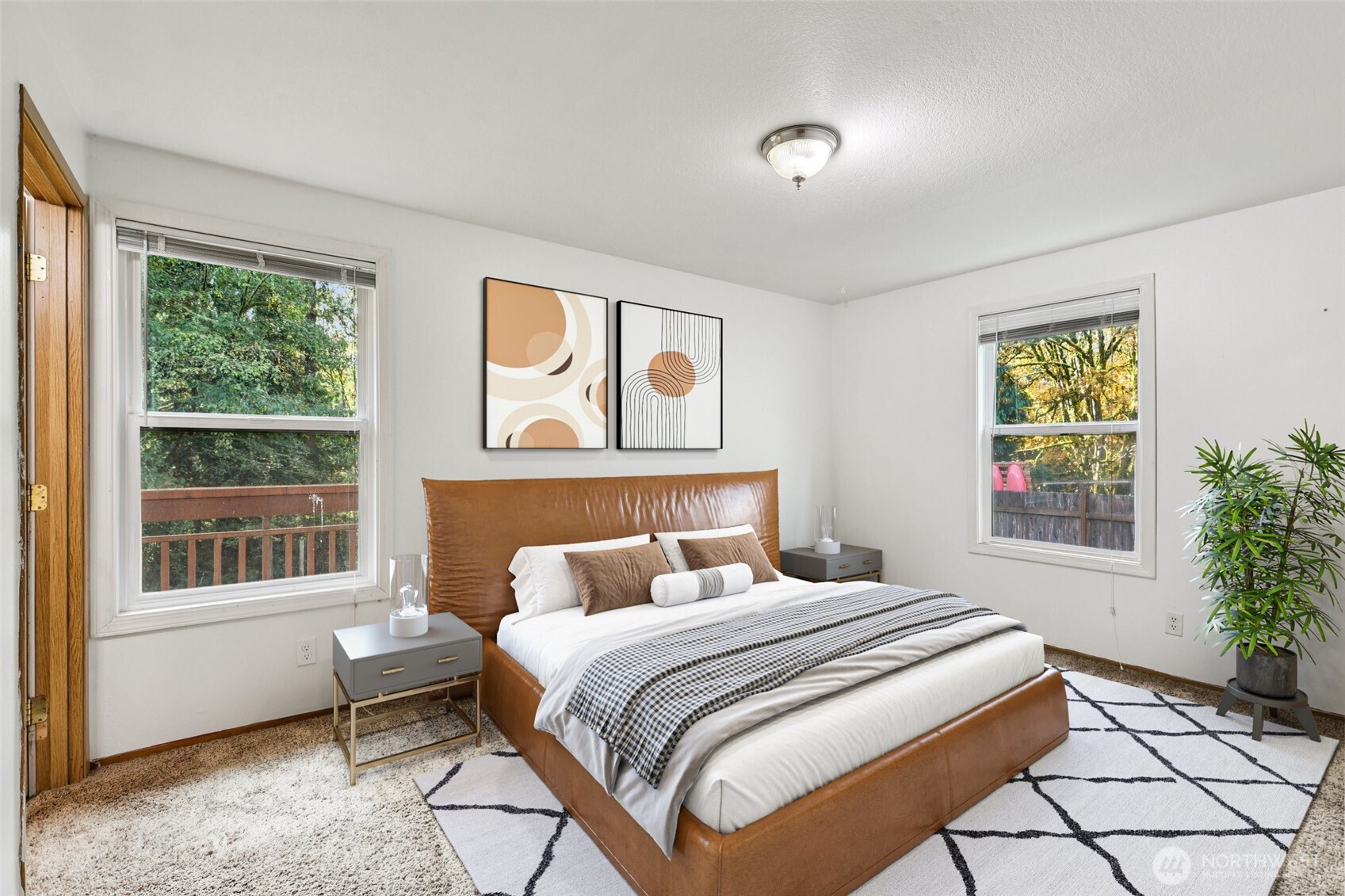 8032 71st Place Southeast Snohomish, WA 98290 - Photo 12 of 32 a bedroom with a bed and a window