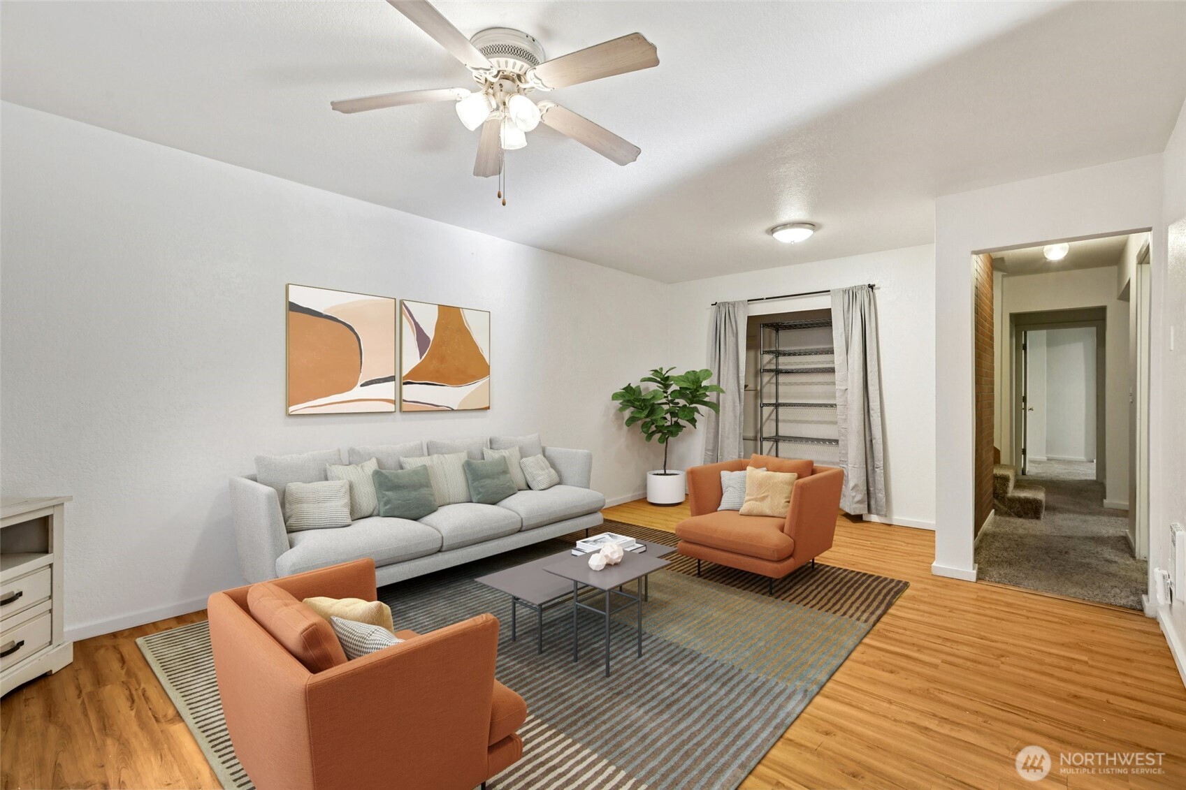 8032 71st Place Southeast Snohomish, WA 98290 - Photo 18 of 32 a living room with furniture and a wooden floor