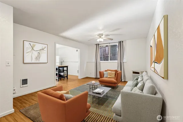 a kitchen with stainless steel appliances granite countertop a stove a sink dishwasher and a microwave oven with cabinets