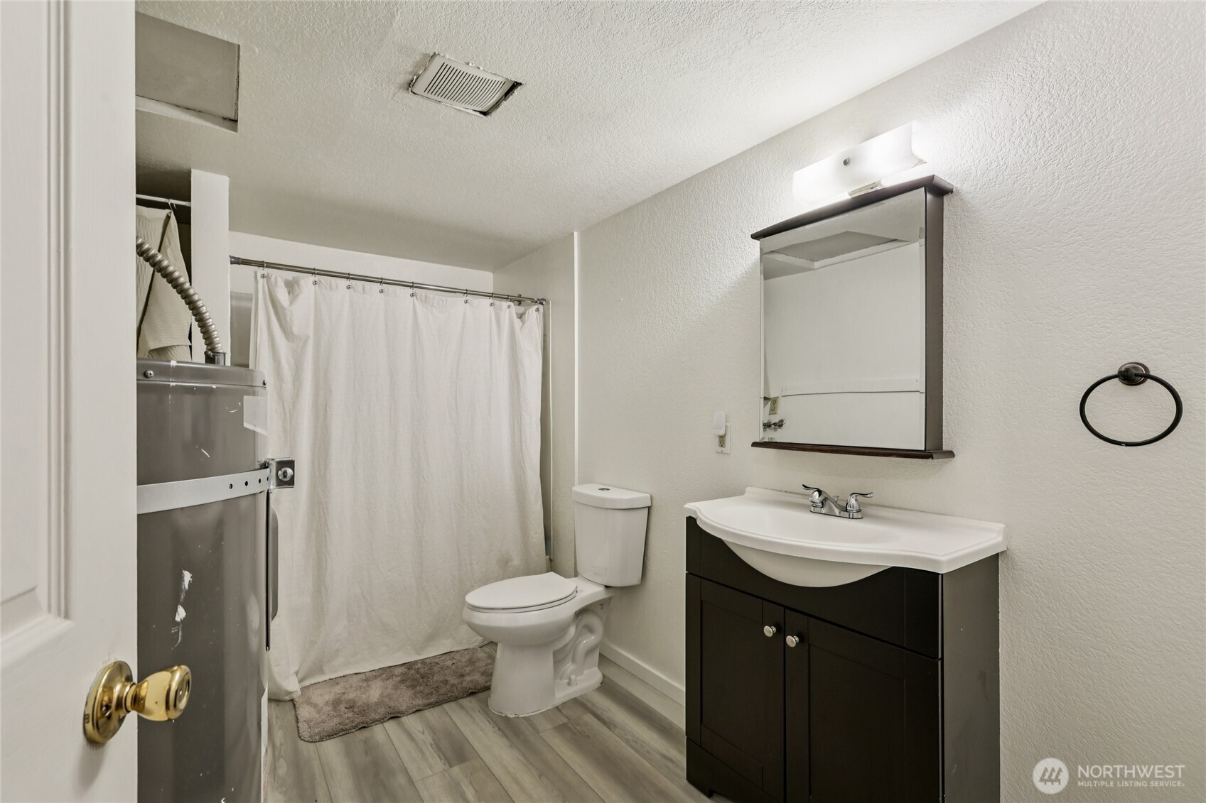 8032 71st Place Southeast Snohomish, WA 98290 - Photo 25 of 32 a bathroom with a sink and a mirror