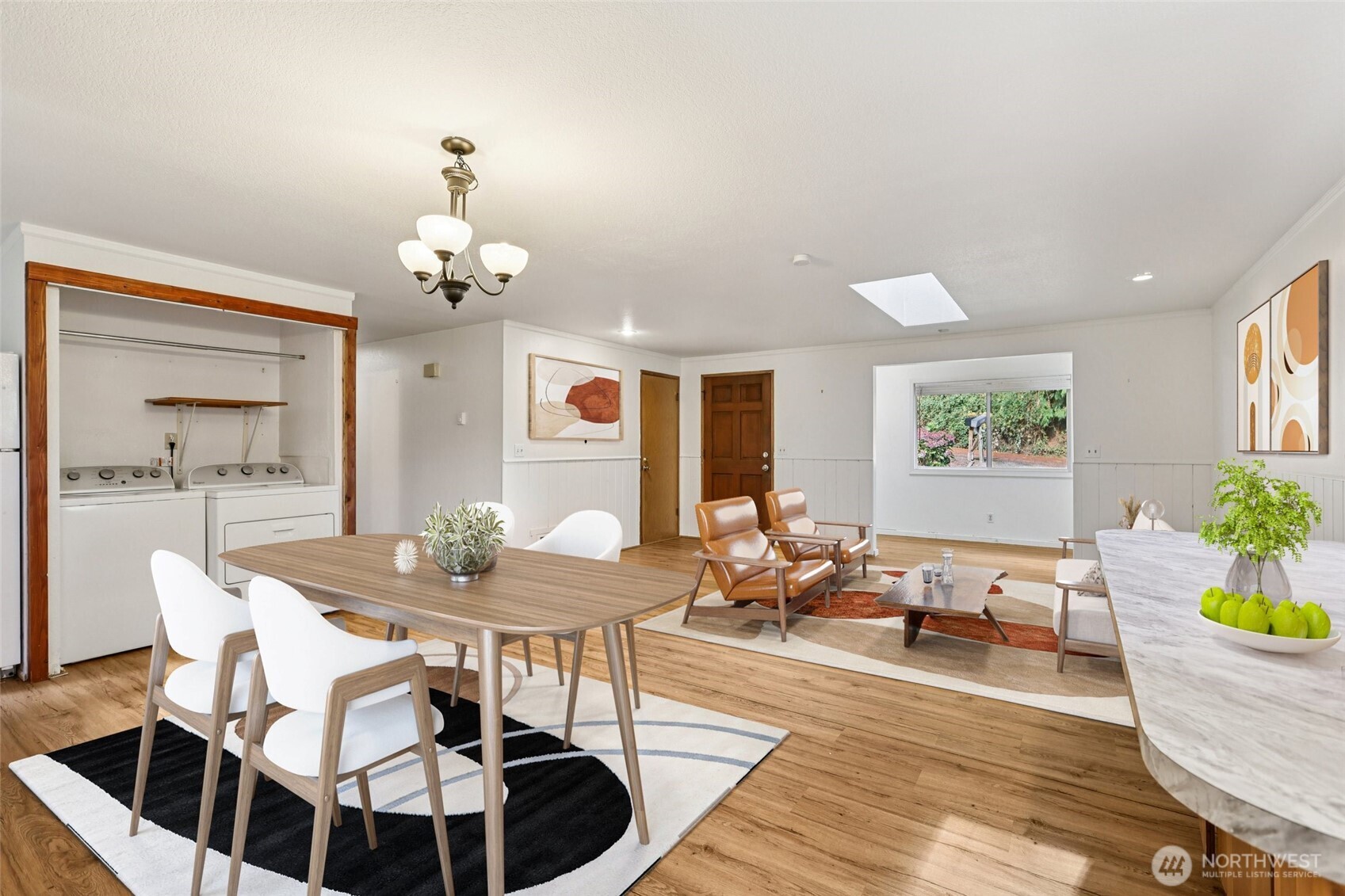 8032 71st Place Southeast Snohomish, WA 98290 - Photo 6 of 32 a view of a dining room with furniture and wooden floor