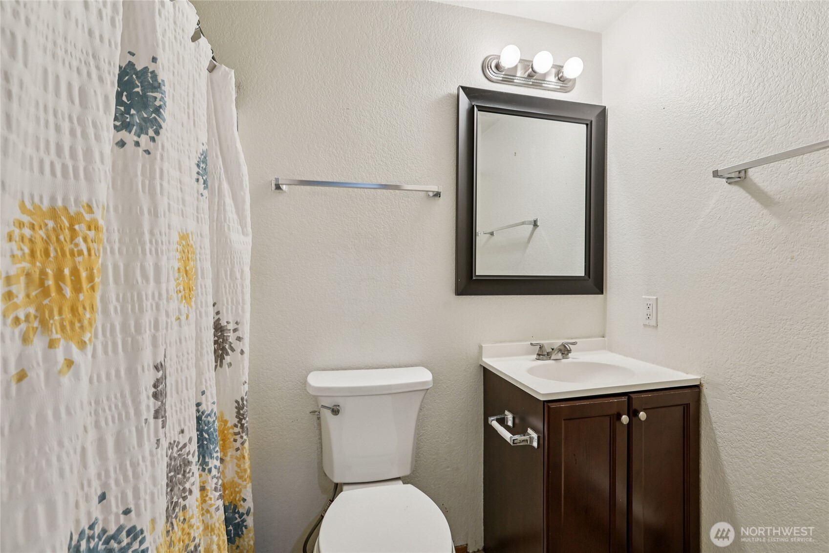 8032 71st Place Southeast Snohomish, WA 98290 - Photo 8 of 32 a bathroom with a toilet a sink and a mirror
