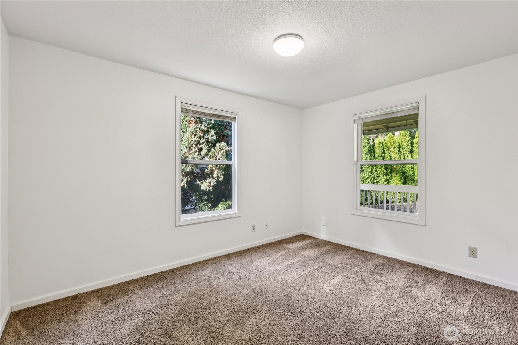 8032 71st Place Southeast Snohomish, WA 98290 - Photo 10 of 32 an empty room with windows