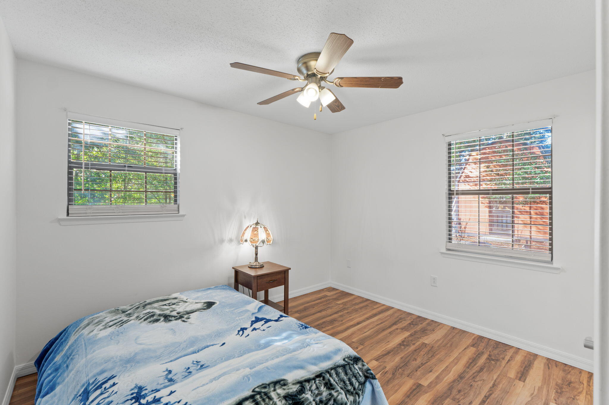 212 Aza Place Crestview, FL 32539 - Photo 12 of 30 a bedroom with a bed and a window