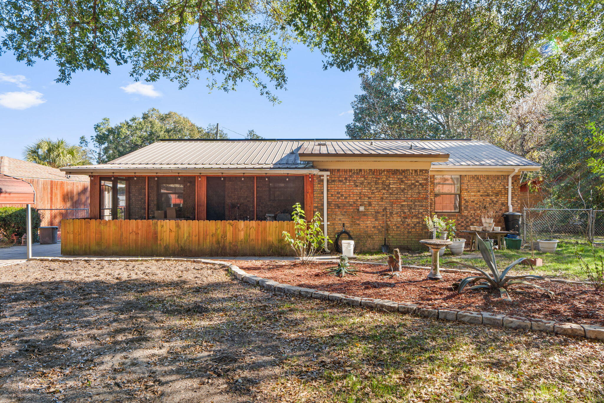 212 Aza Place Crestview, FL 32539 - Photo 19 of 30 a front view of a house with a yard