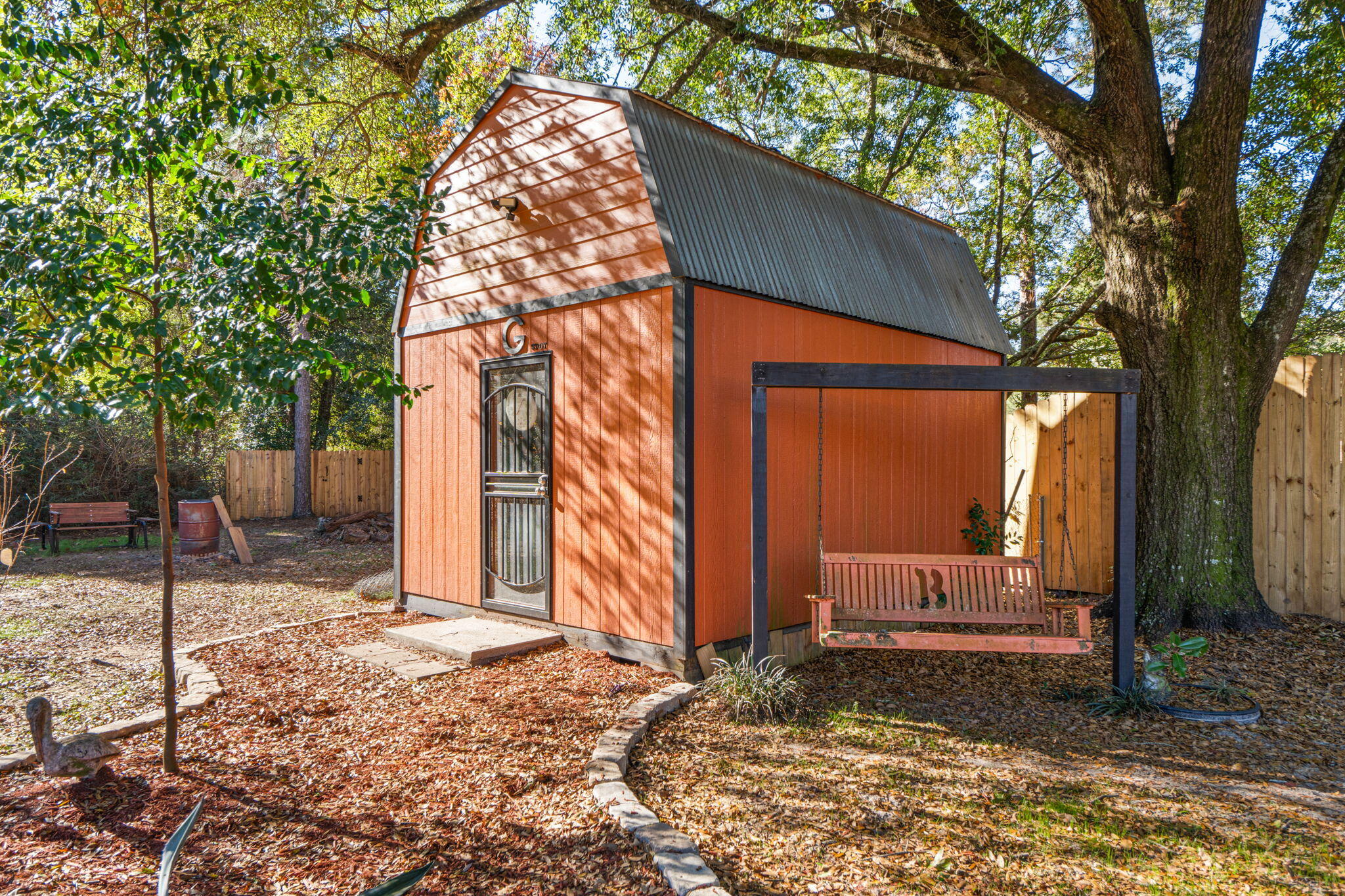 212 Aza Place Crestview, FL 32539 - Photo 20 of 30 a backyard of a house with lots of green space