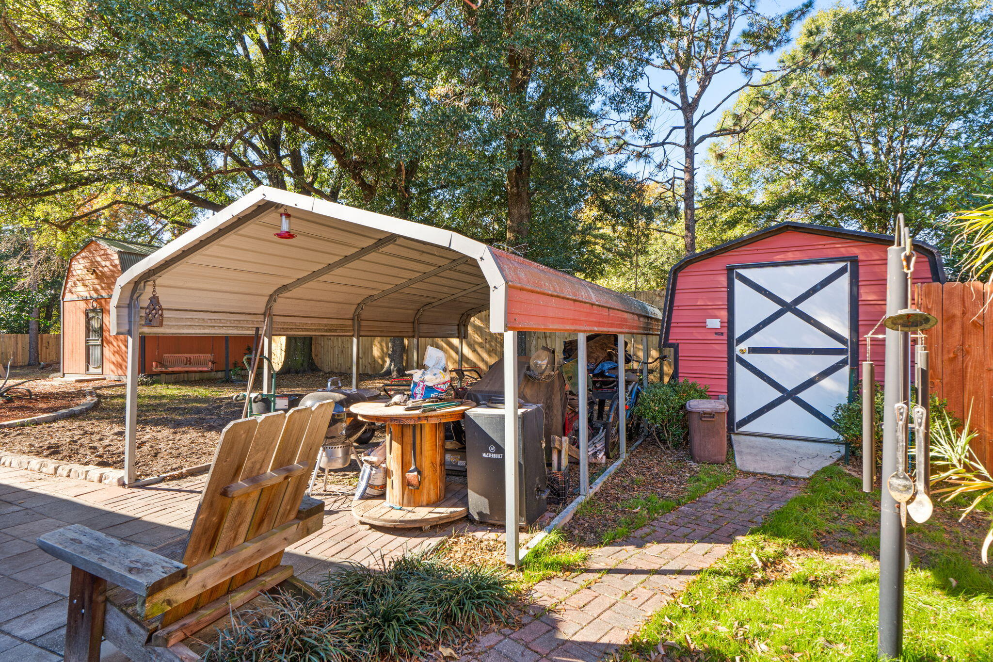 212 Aza Place Crestview, FL 32539 - Photo 26 of 30 an outdoor space with seating