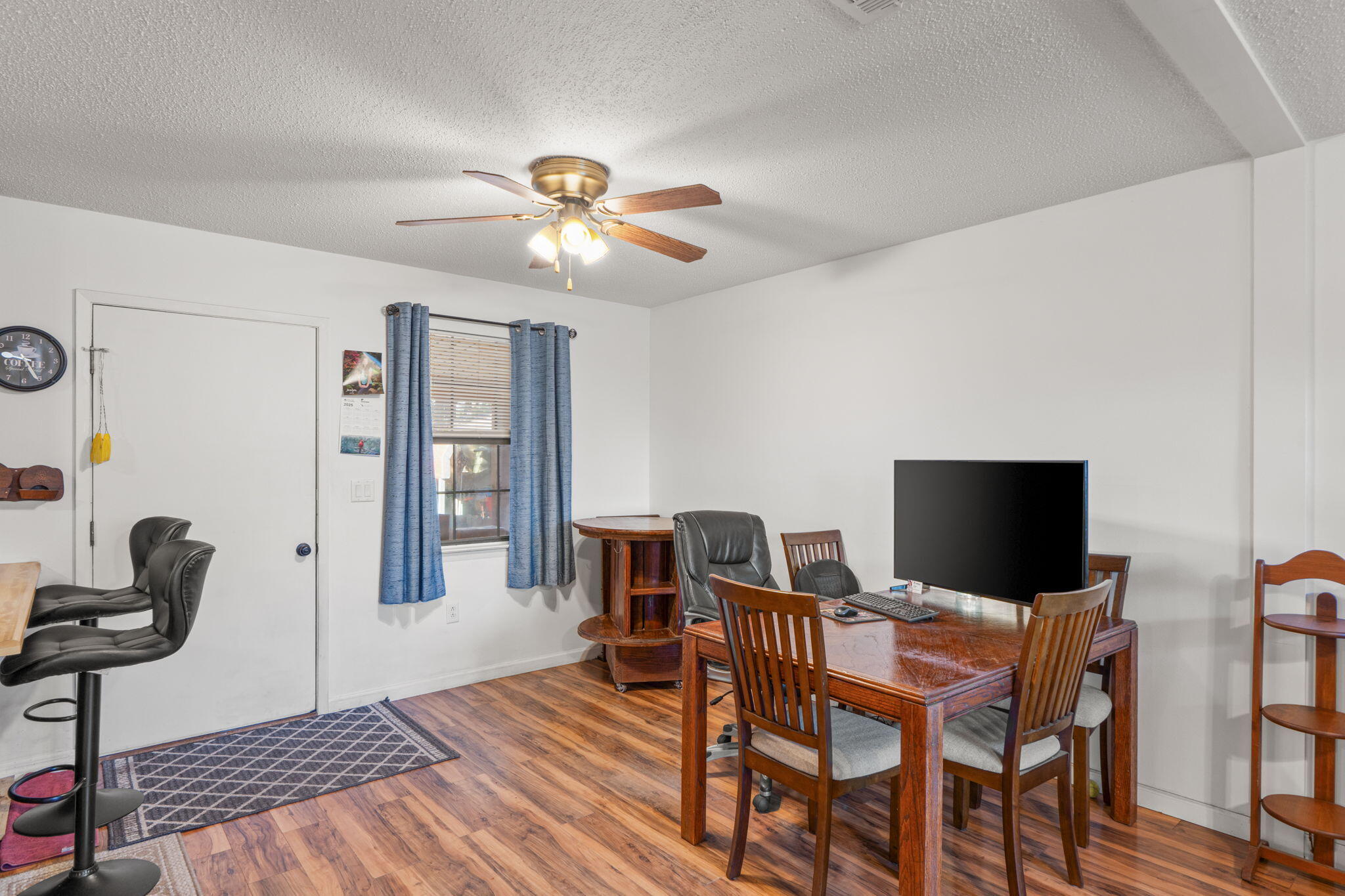212 Aza Place Crestview, FL 32539 - Photo 6 of 30 a view of a livingroom with furniture and a flat screen tv