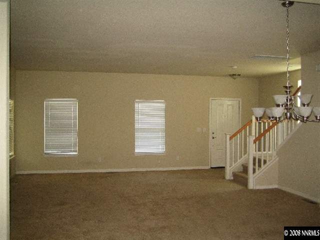 3270 Paragon Place Reno, NV 89509 - Photo 4 of 9 a view of an empty room with a window