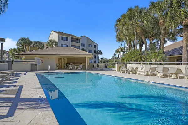 a front view of a house with swimming pool