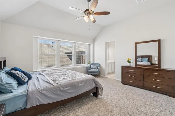 a bathroom with a sink vanity and a mirror