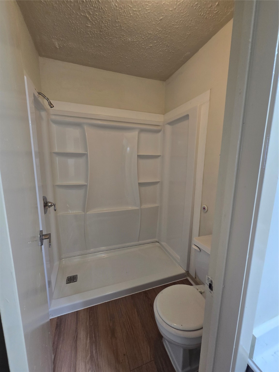 16331 Dew Drop Lane Houston, TX 77095 - Photo 13 of 20 a bathroom with a shower a toilet and a sink