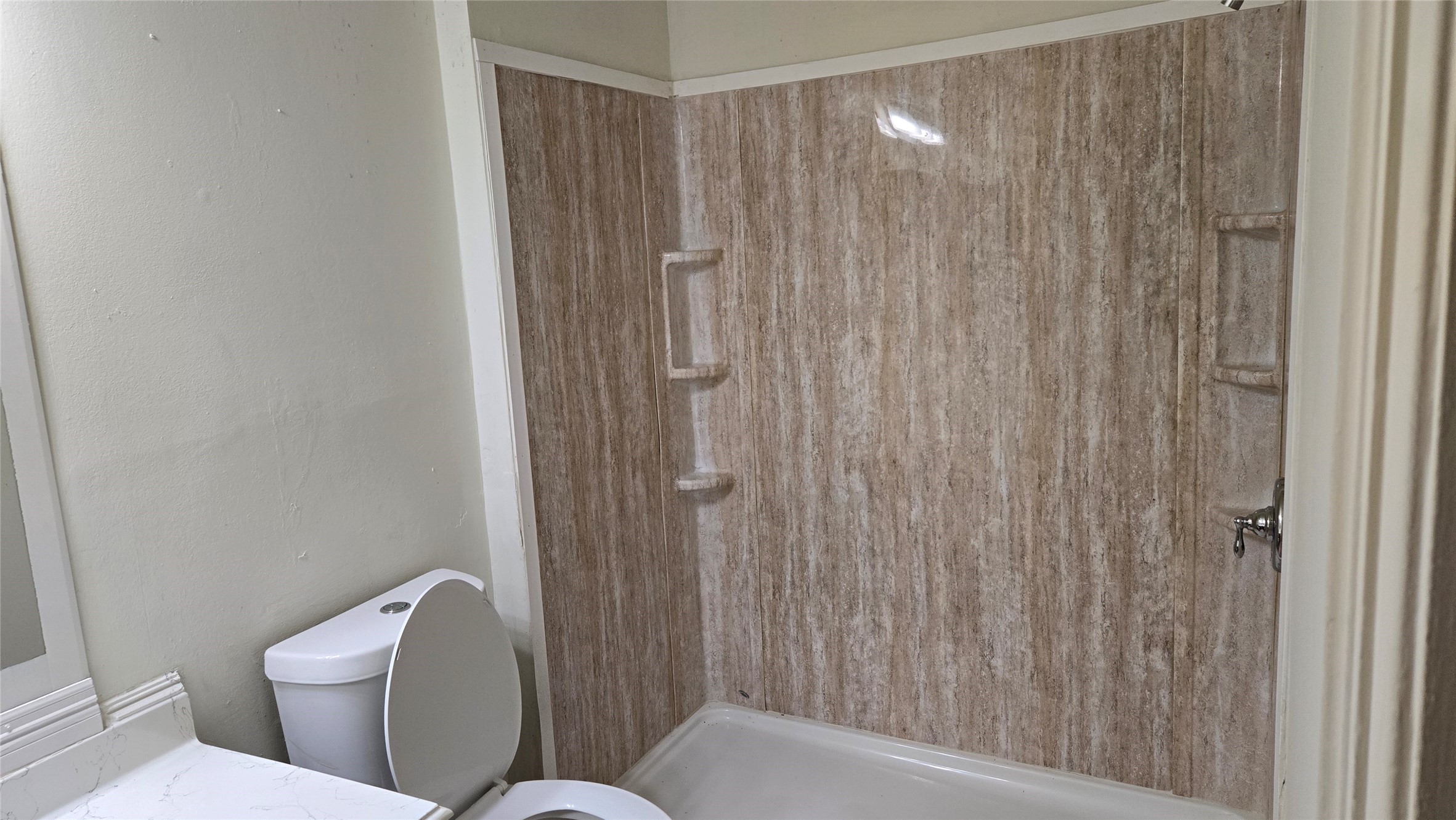 16331 Dew Drop Lane Houston, TX 77095 - Photo 20 of 20 a bathroom with a toilet and a shower curtain
