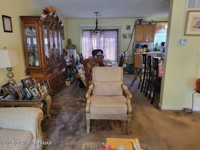 a kitchen that has a cabinets and a table in it