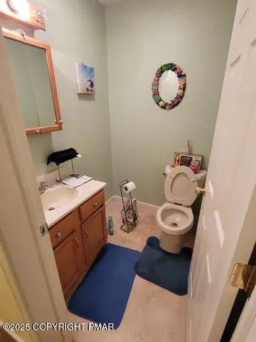 a group of people sitting on a floor in a room