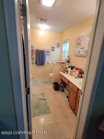 a room with furniture and flat screen tv