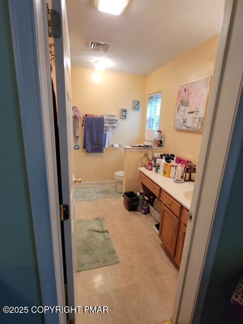 2137 Freedom Way Pocono Summit, PA 18346 - Photo 21 of 40 a bathroom with a tub sink and mirror