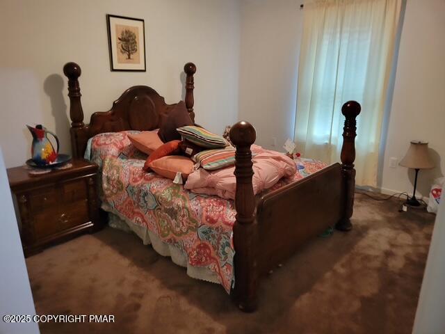 2137 Freedom Way Pocono Summit, PA 18346 - Photo 38 of 40 a bed room with a bed and a mirror