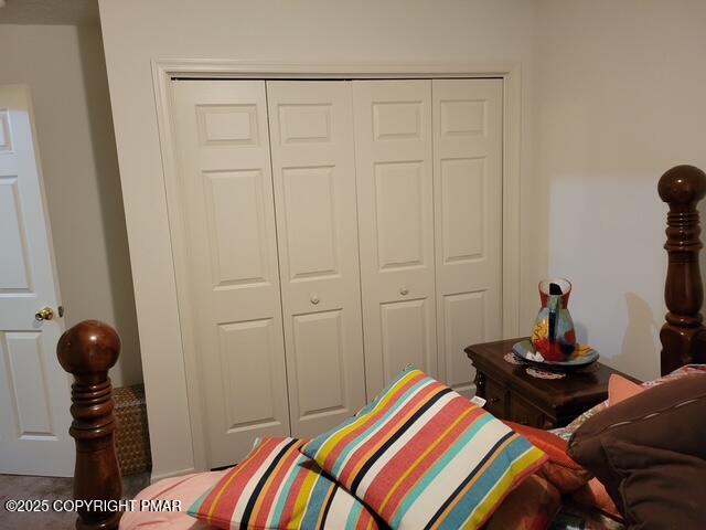 2137 Freedom Way Pocono Summit, PA 18346 - Photo 39 of 40 a bedroom with a bed and wooden floor