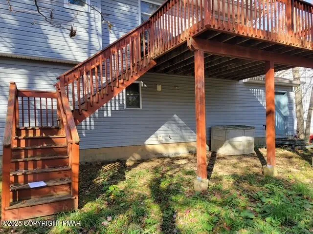 a view of house with backyard porch