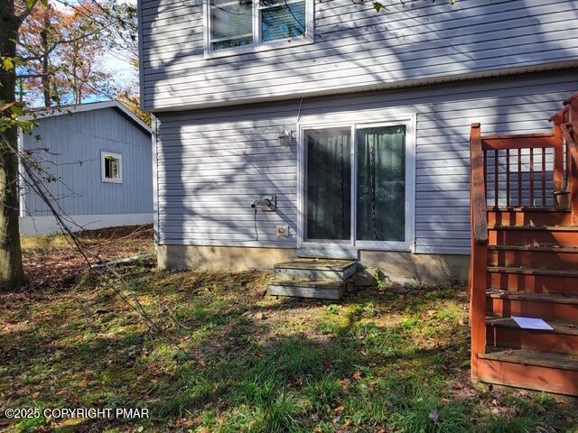 2137 Freedom Way Pocono Summit, PA 18346 - Photo 9 of 40 a view of house with backyard porch