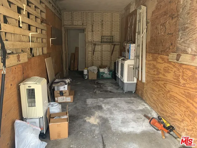 a view of a car park in front of house