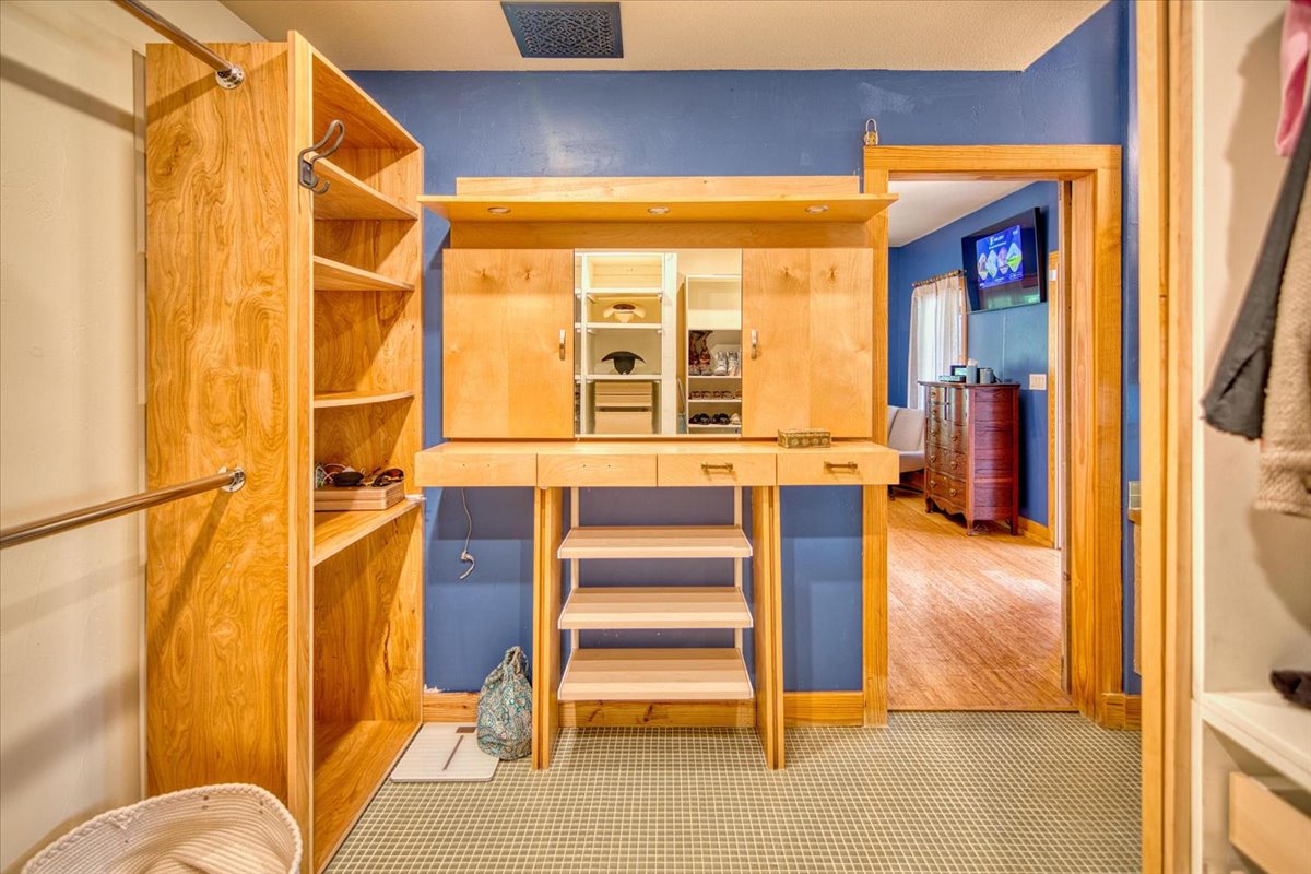 301 Blessing Ranch Road Liberty Hill, TX 78642 - Photo 14 of 40 a view of walk in closet with empty racks