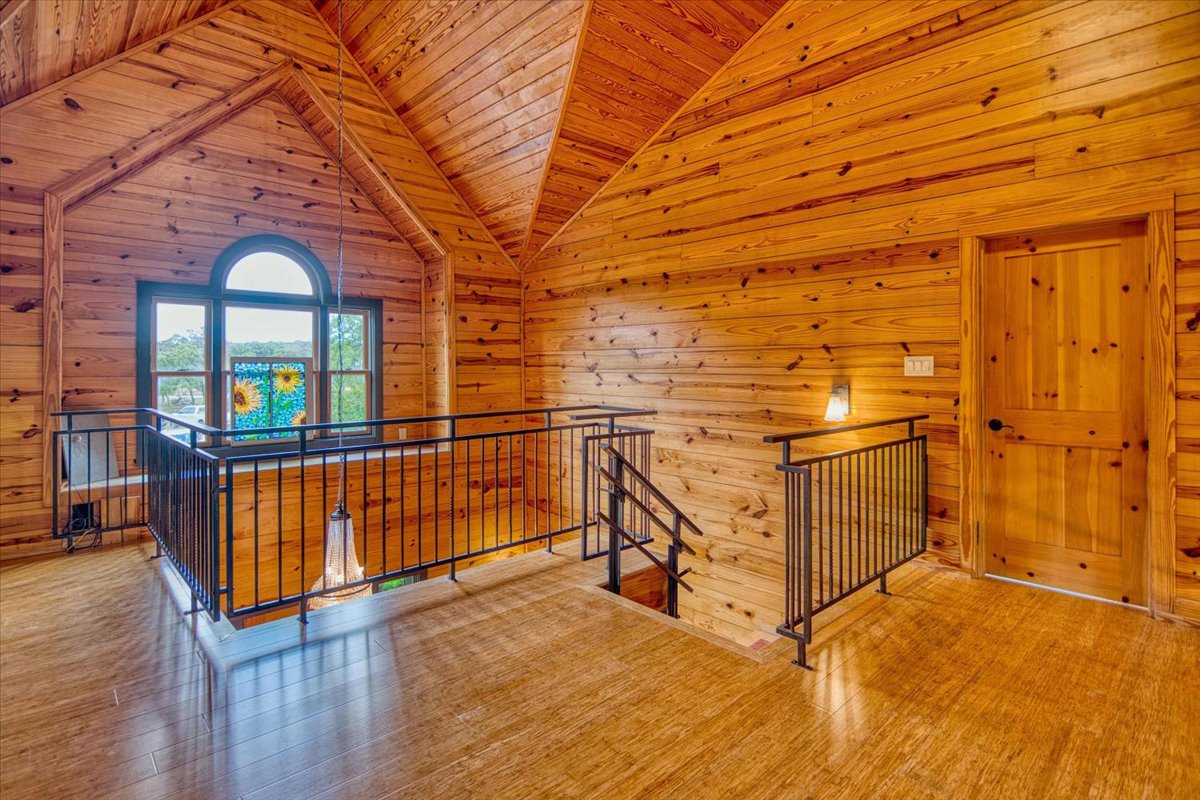 301 Blessing Ranch Road Liberty Hill, TX 78642 - Photo 18 of 40 a view of a hardwood & staircase