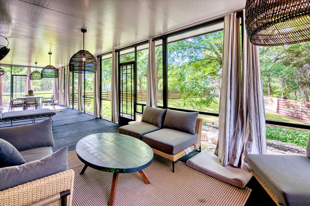 301 Blessing Ranch Road Liberty Hill, TX 78642 - Photo 27 of 40 a living room with furniture and a large window