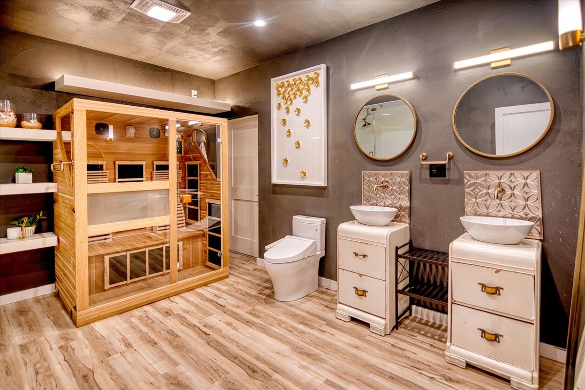 301 Blessing Ranch Road Liberty Hill, TX 78642 - Photo 32 of 40 a bathroom with a toilet a sink and a mirror