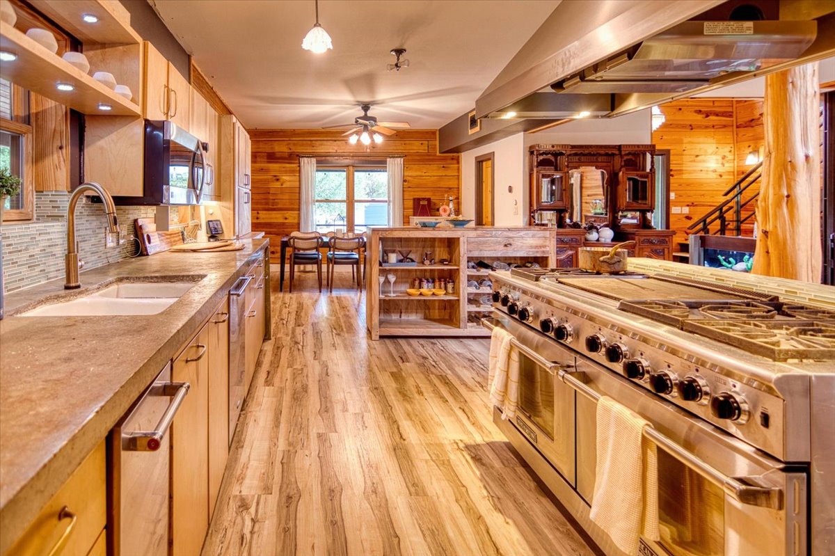 301 Blessing Ranch Road Liberty Hill, TX 78642 - Photo 10 of 40 a kitchen with lots of counter top space