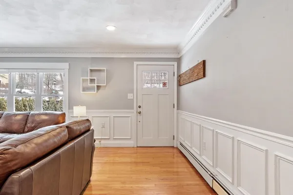 a living room with furniture and a rug